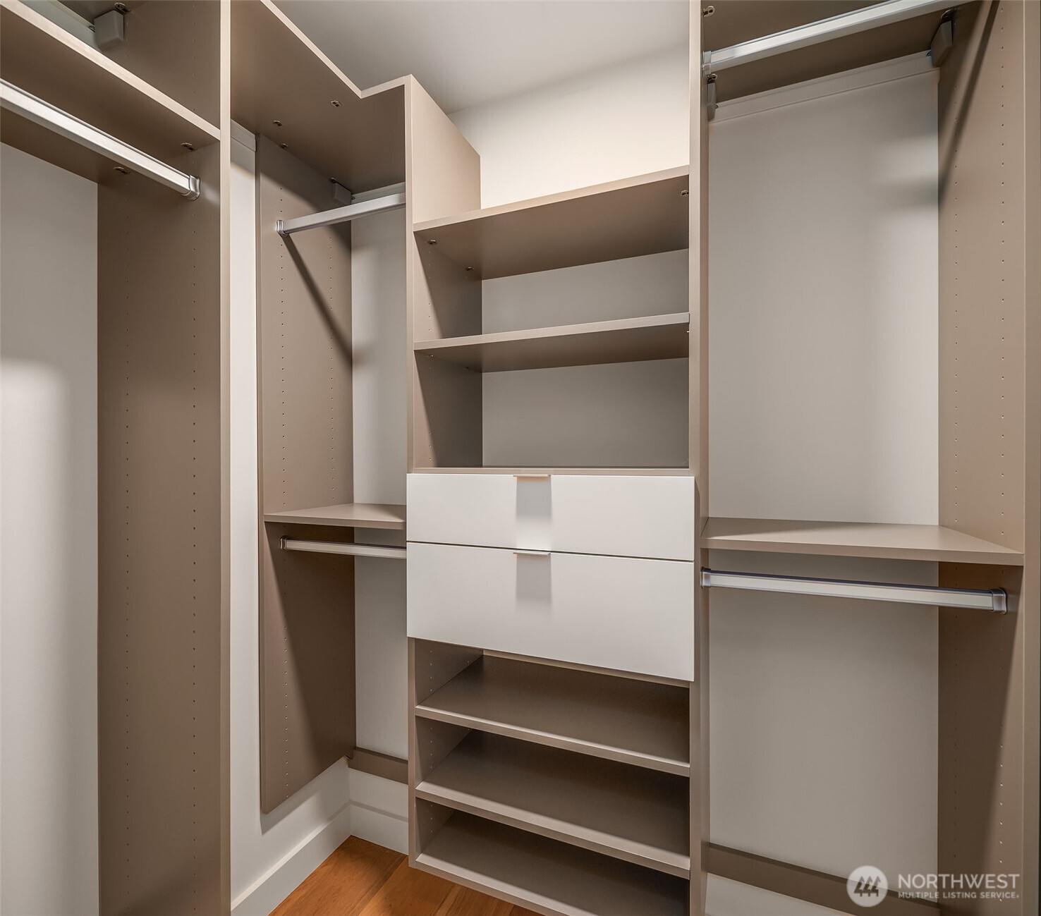 121 Stewart Street, Unit 1803 Seattle, WA 98101 - Photo 23 of 35 a utility room with closet