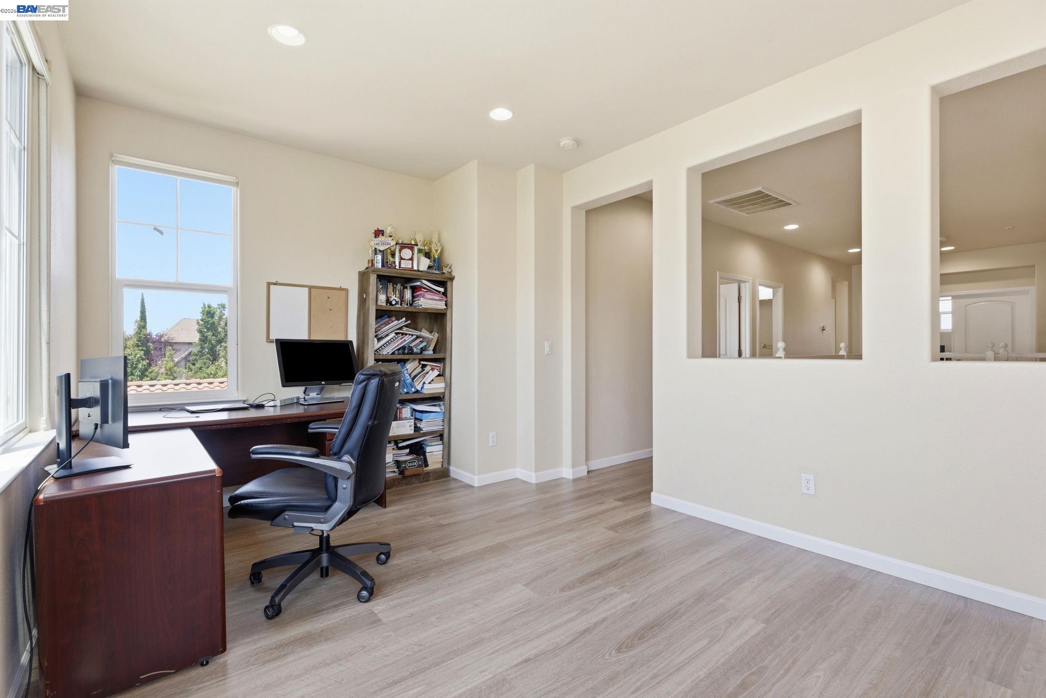5029 Queensbury Way San Ramon, CA 94582 - Photo 18 of 58 a view of a workspace with furniture and a window
