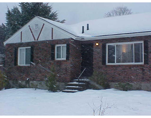 17 Sunset Road Winchester, MA 01890 - Photo 1 of 5 a front view of a house with a yard