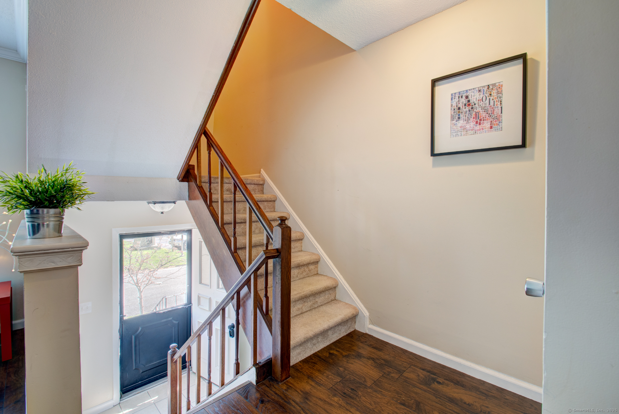 184 Gravel Street, Unit 26 Meriden, CT 06450 - Photo 12 of 27 a view of staircase with wooden floor and stairs