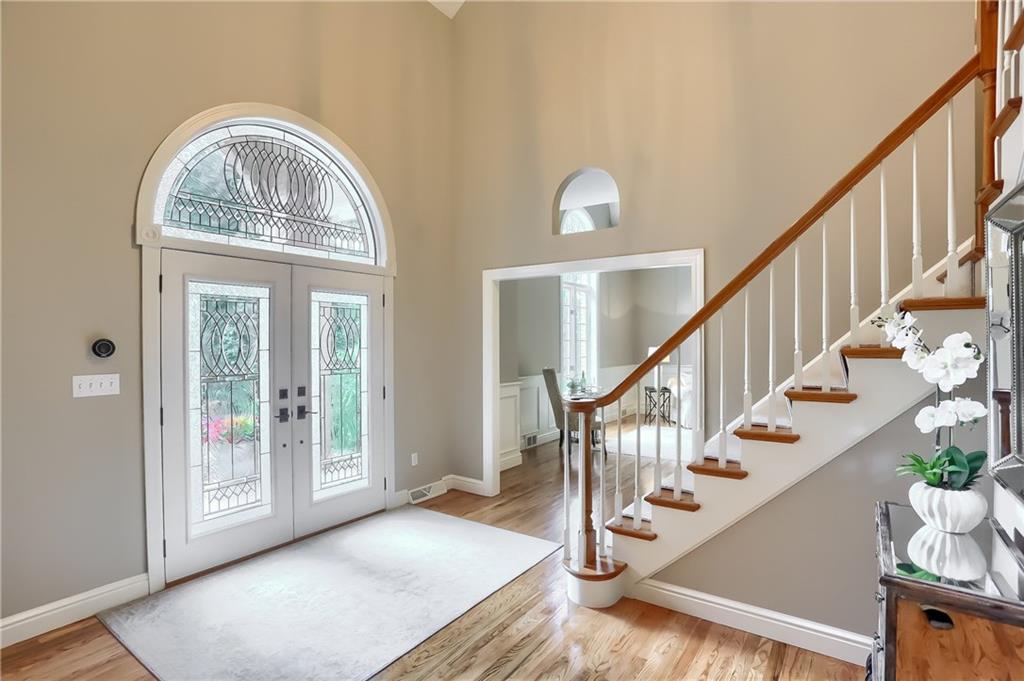 337 Parker Road Sarver, PA 16055 - Photo 3 of 25 Spacious two story entry with spectacular leaded glass double doors and pristine hardwood floors.