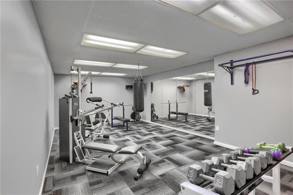337 Parker Road Sarver, PA 16055 - Photo 22 of 25 Full gym in the basement with mirrored wall and new carpeting. Equipment included!