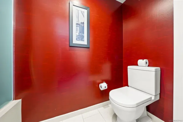 a bathroom with a toilet and a sink