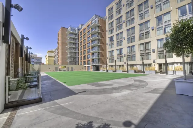 a view of a building with a yard