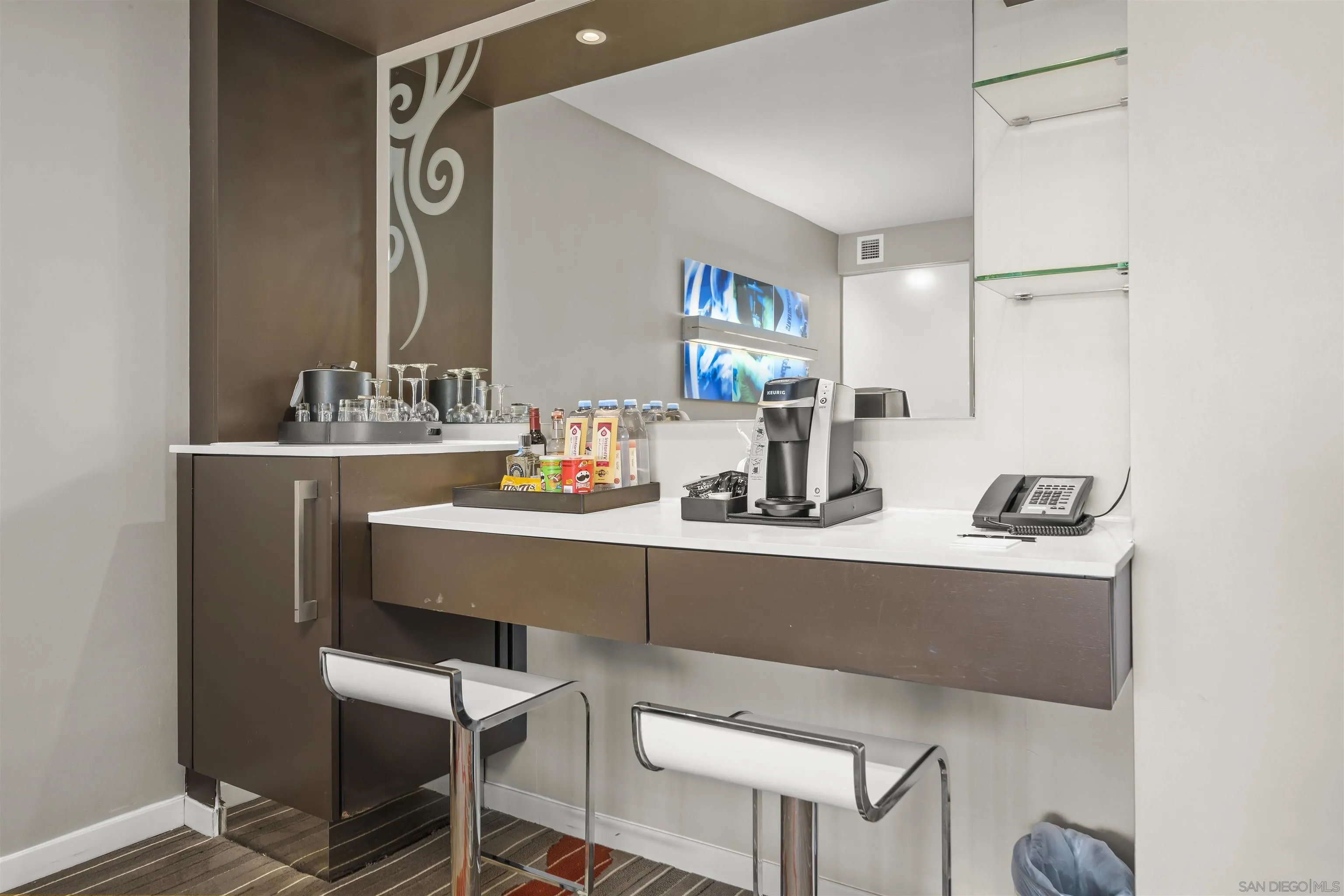 207 Fifth Avenue, Unit 940 San Diego, CA 92101 - Photo 5 of 31 a dining room with table and chairs