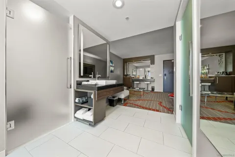 a view of kitchen with sink and furniture