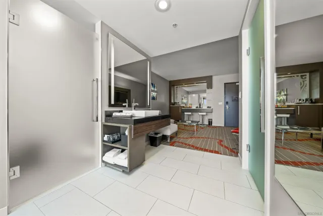 a view of kitchen with sink and furniture