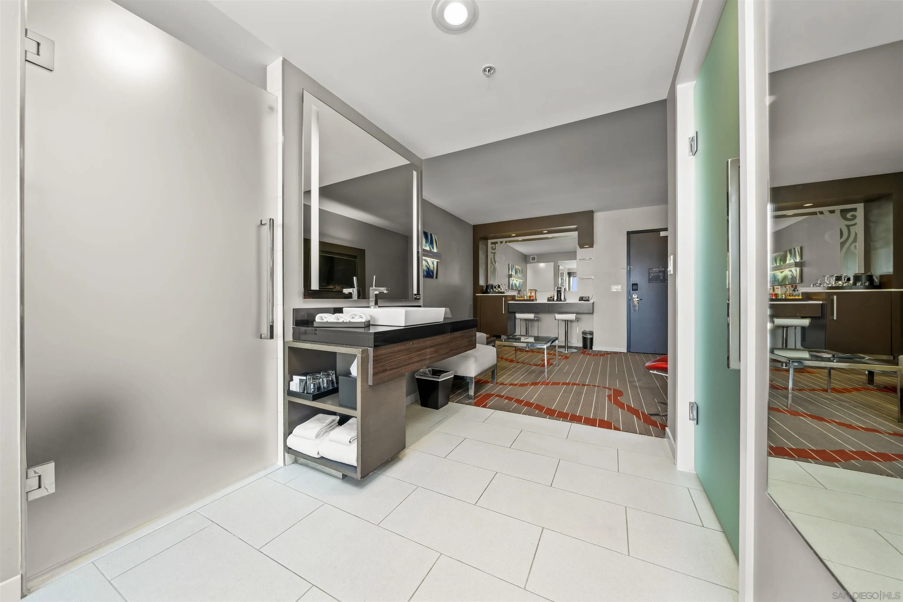 207 Fifth Avenue, Unit 940 San Diego, CA 92101 - Photo 7 of 31 a view of kitchen with sink and furniture