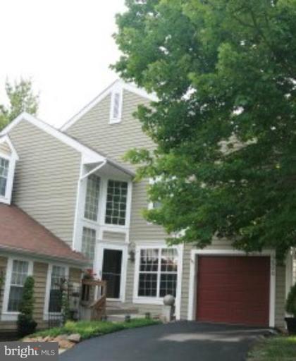 1506 Deer Point Way Reston, VA 20194 - Photo 1 of 30 front view of a house with a yard