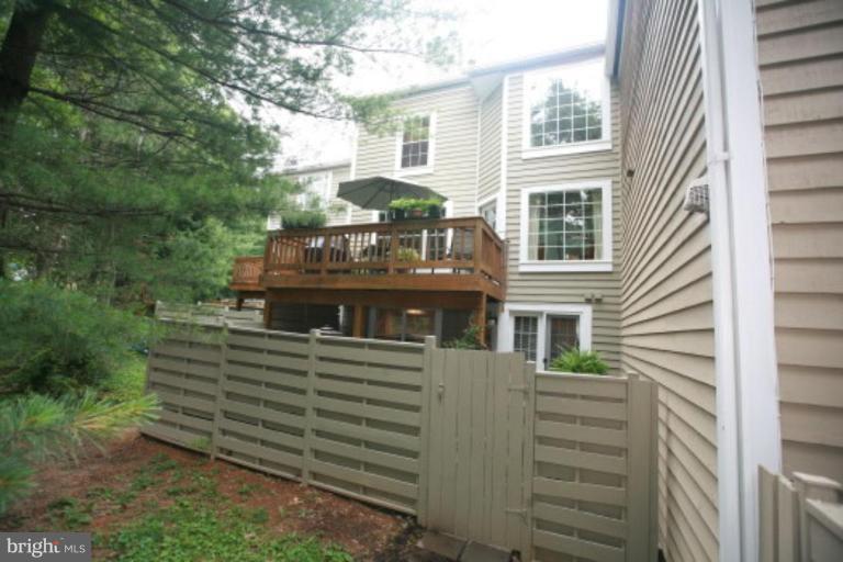1506 Deer Point Way Reston, VA 20194 - Photo 24 of 30 a view of a house with a yard