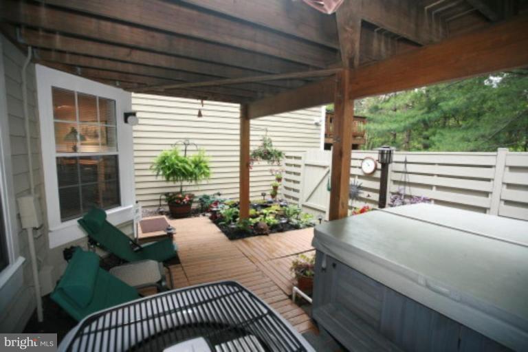 1506 Deer Point Way Reston, VA 20194 - Photo 25 of 30 a outdoor living space with furniture and garden view