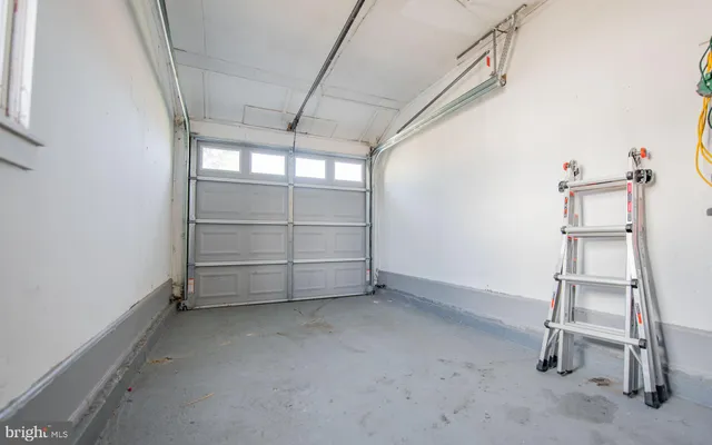 a view of room with racks on the wall