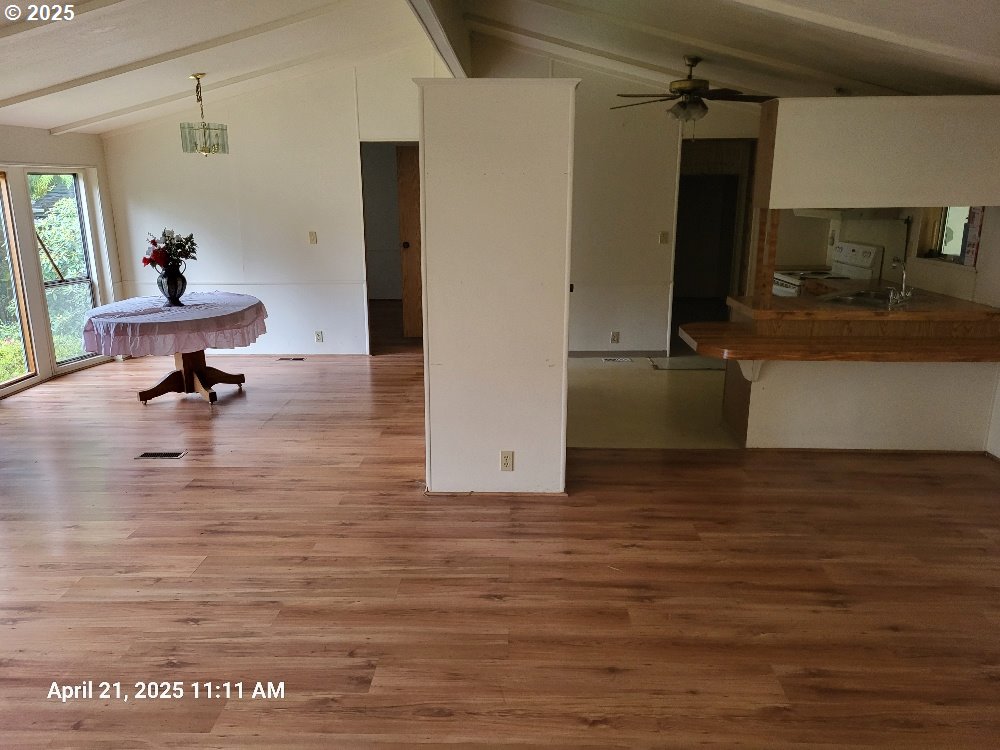 1050 North Cedar Point Road Coquille, OR 97423 - Photo 23 of 29 a view of a living room and bathroom