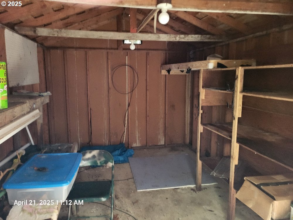 1050 North Cedar Point Road Coquille, OR 97423 - Photo 25 of 29 a room with water heater and a cabinet