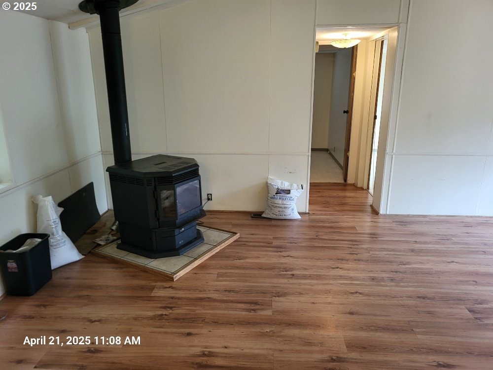 1050 North Cedar Point Road Coquille, OR 97423 - Photo 8 of 29 a view of living room with furniture and a potted plant