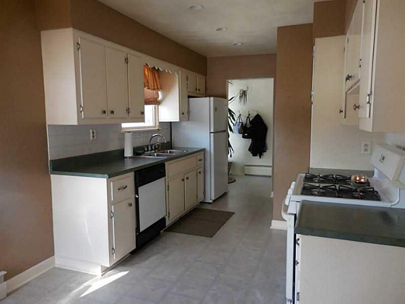 217 Kelley Road Industry, PA 15052 - Photo 2 of 25 Kitchen. light bright and clean eat in kitchen! Fresh paint and appliances.