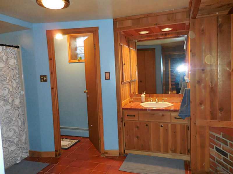 217 Kelley Road Industry, PA 15052 - Photo 16 of 25 Full Bath. Full bath on lower level offers hot tub, separate shower,toilet closet, vanity with tile flooring... nice!