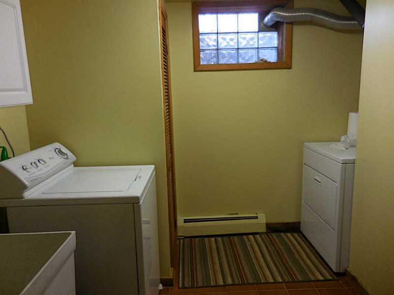 217 Kelley Road Industry, PA 15052 - Photo 19 of 25 Other. Laundry room with utility sink and storage! Washer and dryer come with house!