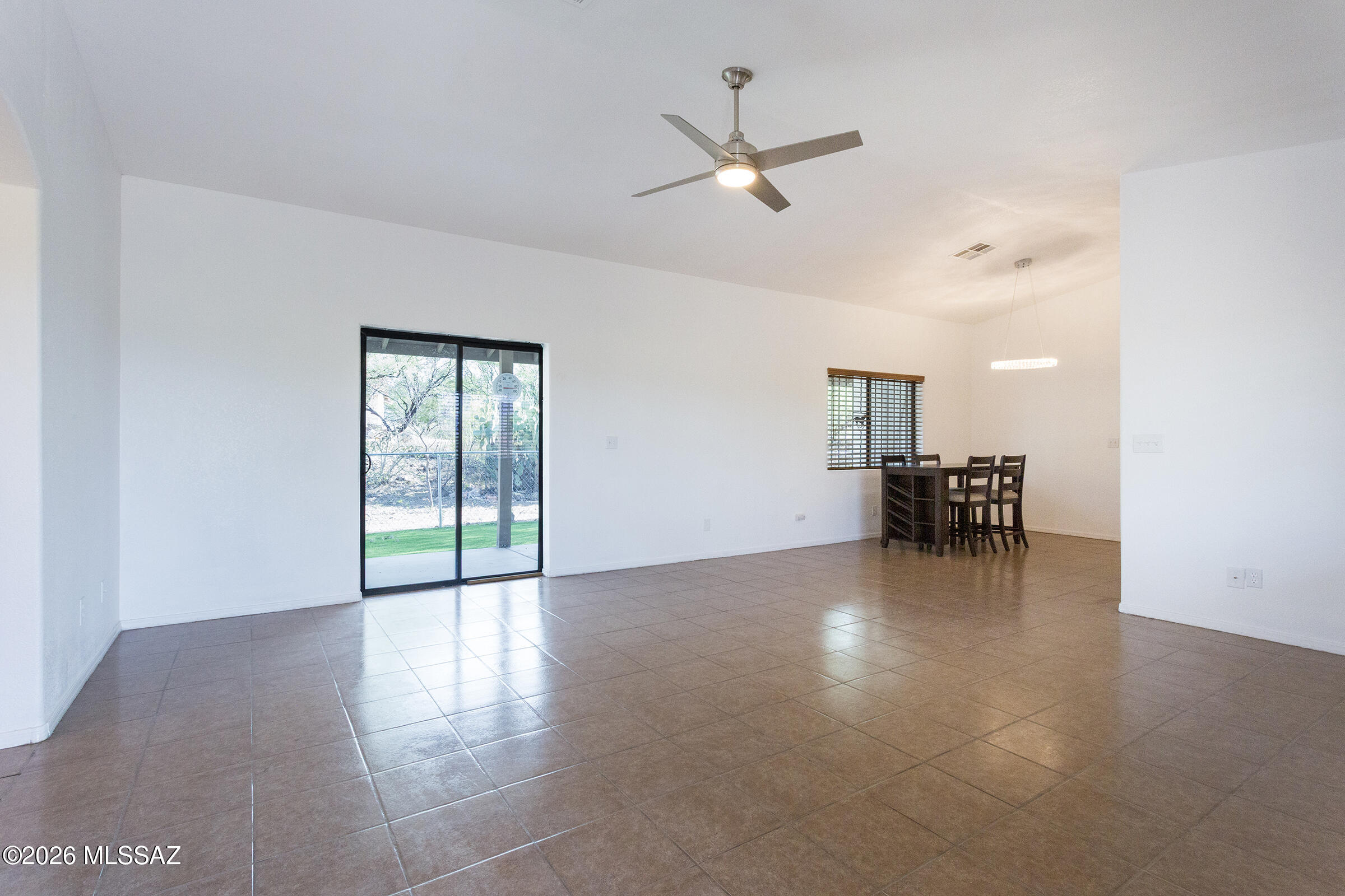 1081 Paseo Freno Rio Rico, AZ 85648 - Photo 4 of 46 a view of an empty room with a window