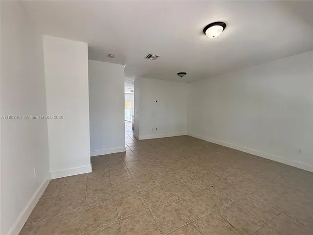 an empty room with an entryway