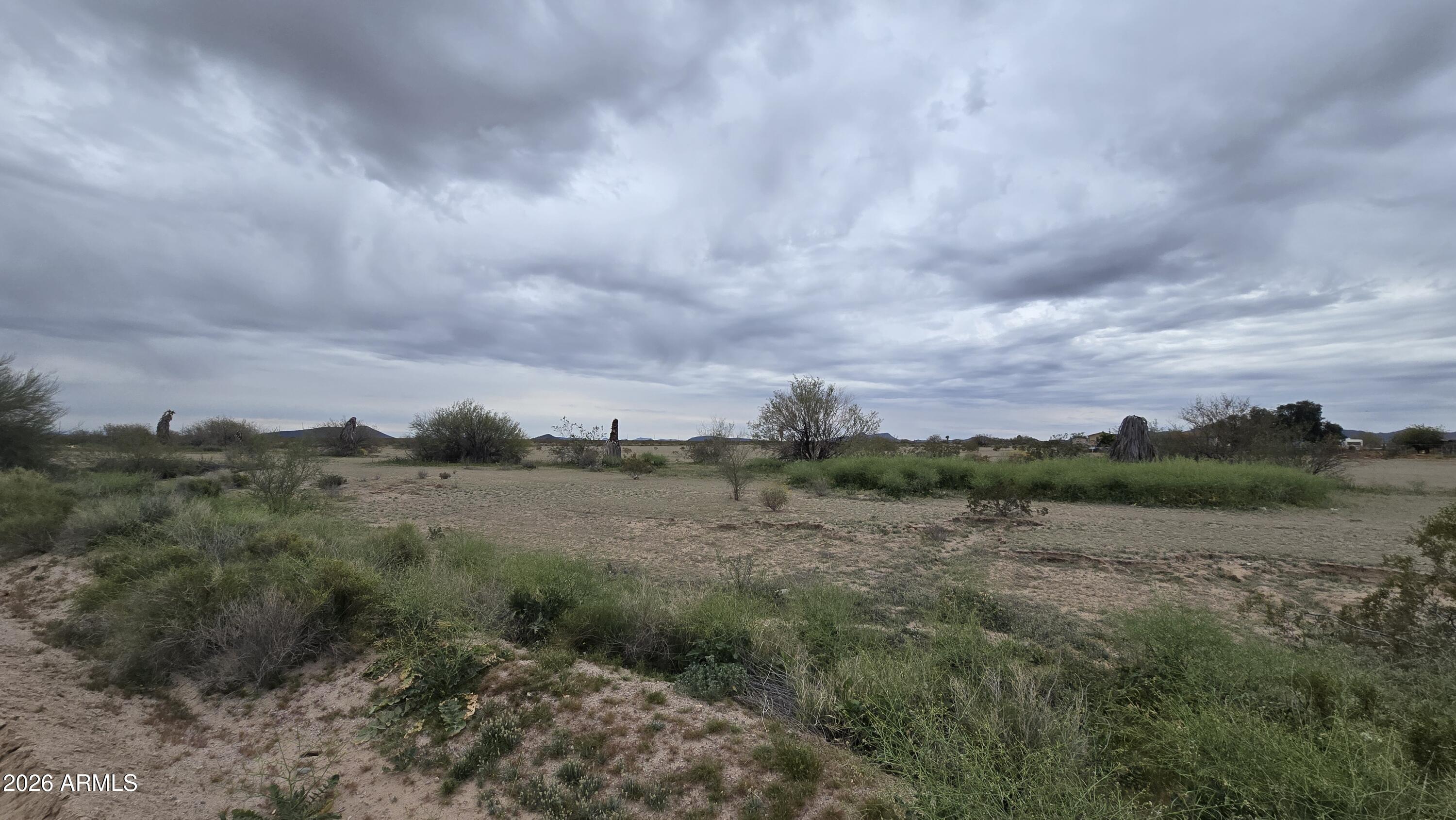 539-aa West Eagletail Road Tonopah, AZ 85354 - Photo 18 of 32 a view of a lake with houses in back