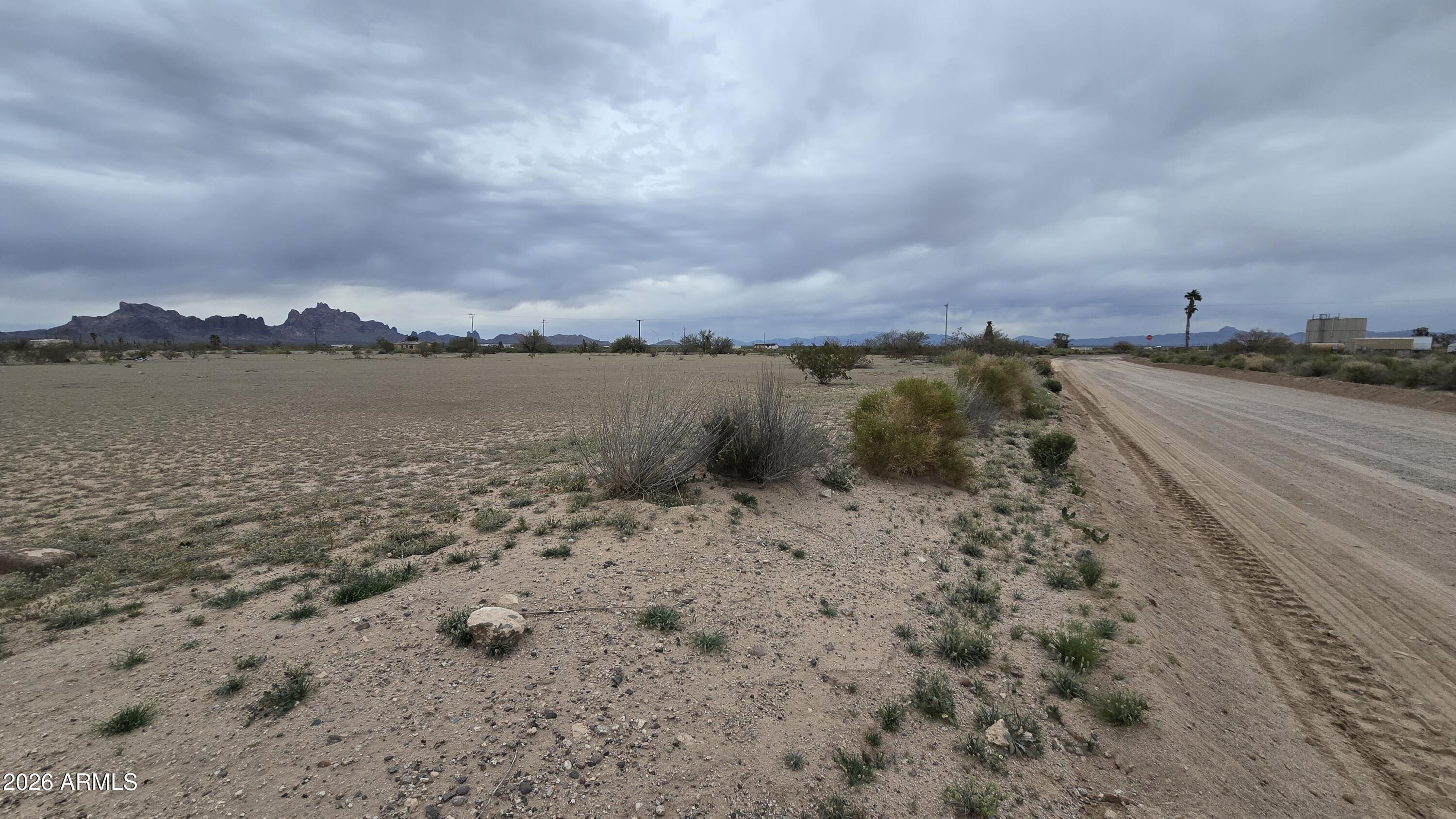 539-aa West Eagletail Road Tonopah, AZ 85354 - Photo 23 of 32 a view of a lake with beach and mountain in the back