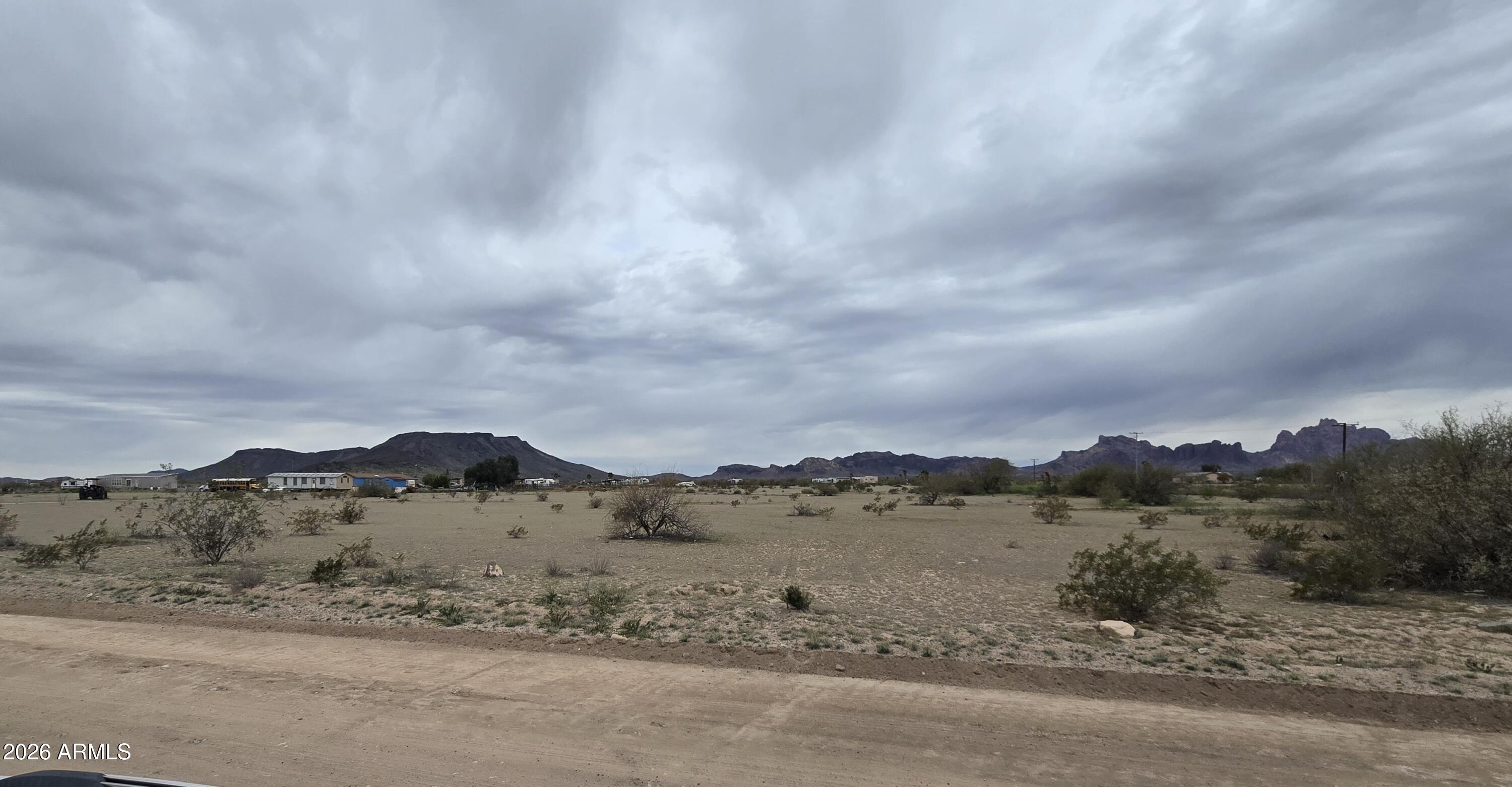 539-aa West Eagletail Road Tonopah, AZ 85354 - Photo 25 of 32 a view of a lake with a mountain in the background