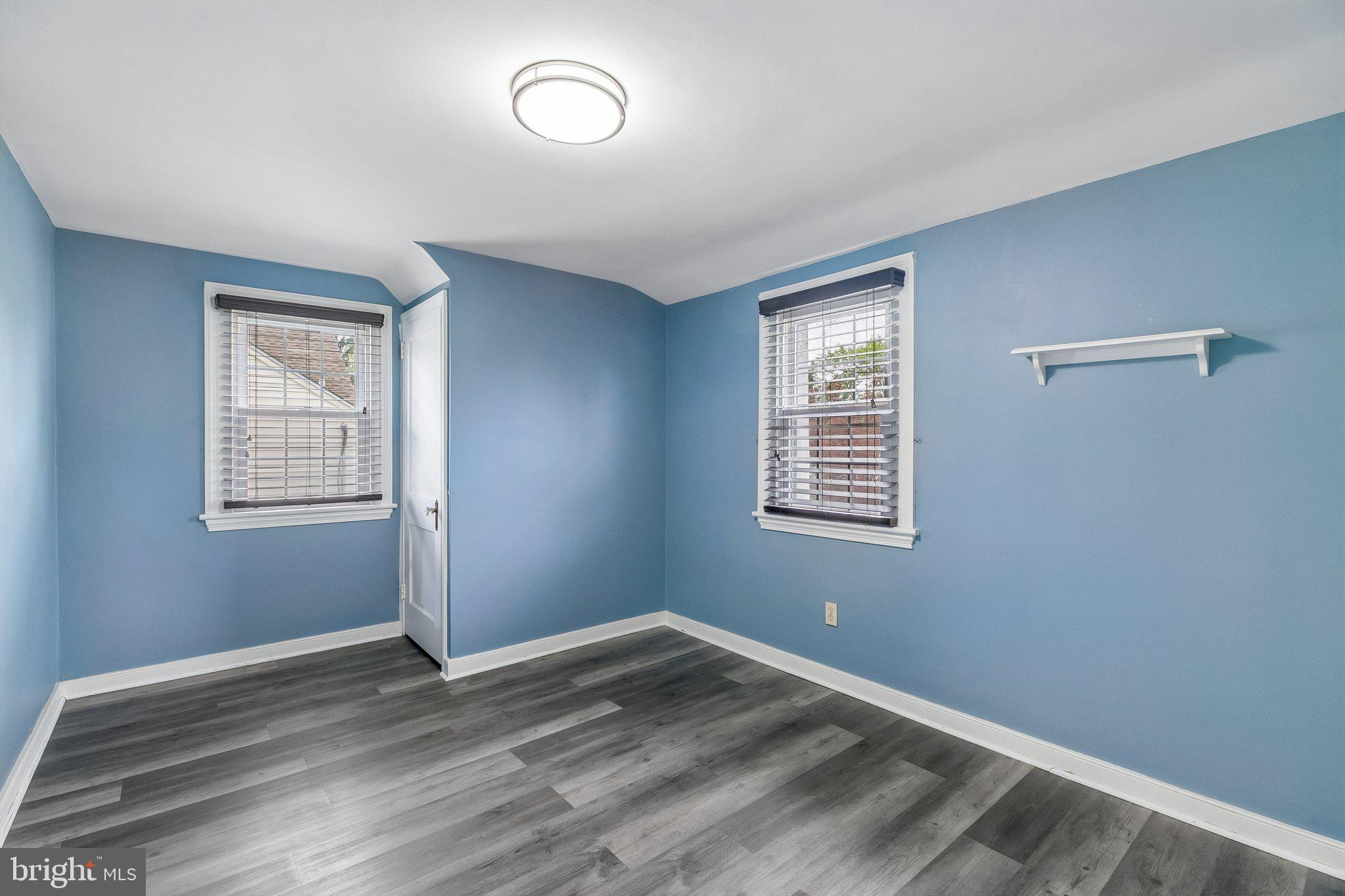 556 Anne Street Huntingdon Valley, PA 19006 - Photo 17 of 50 a view of a room with wooden floor and windows