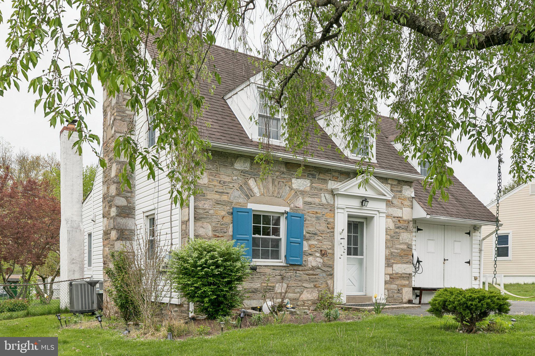 556 Anne Street Huntingdon Valley, PA 19006 - Photo 2 of 50 front view of a house with a yard