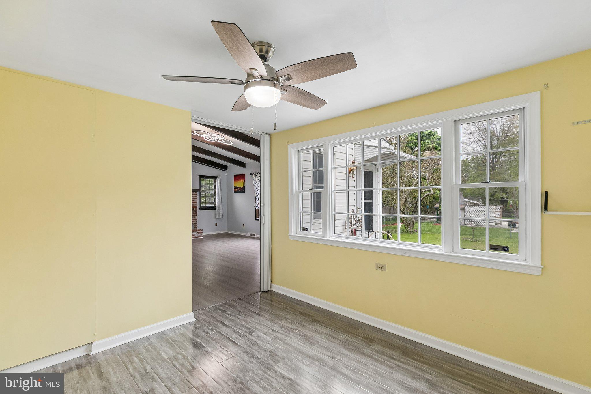 556 Anne Street Huntingdon Valley, PA 19006 - Photo 23 of 50 a view of empty room with wooden floor and fan