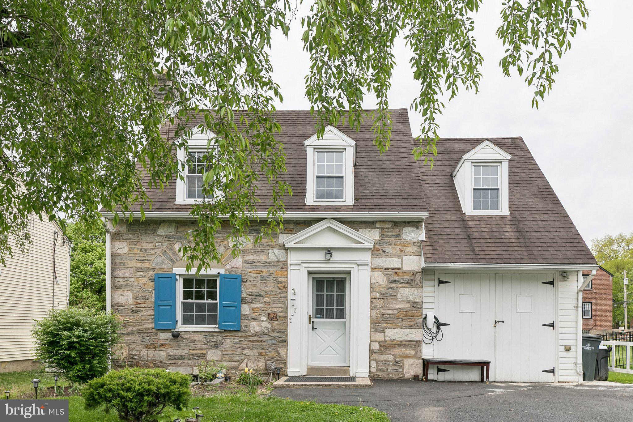 556 Anne Street Huntingdon Valley, PA 19006 - Photo 24 of 50 a front view of a house with a yard
