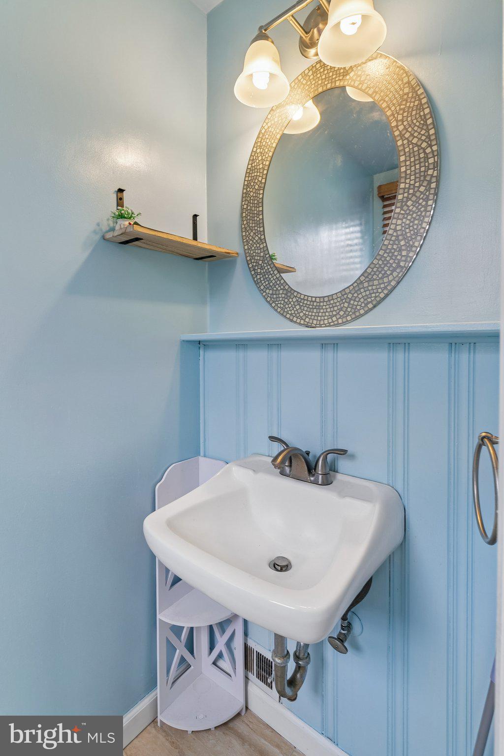 556 Anne Street Huntingdon Valley, PA 19006 - Photo 26 of 50 a bathroom with a sink and mirror