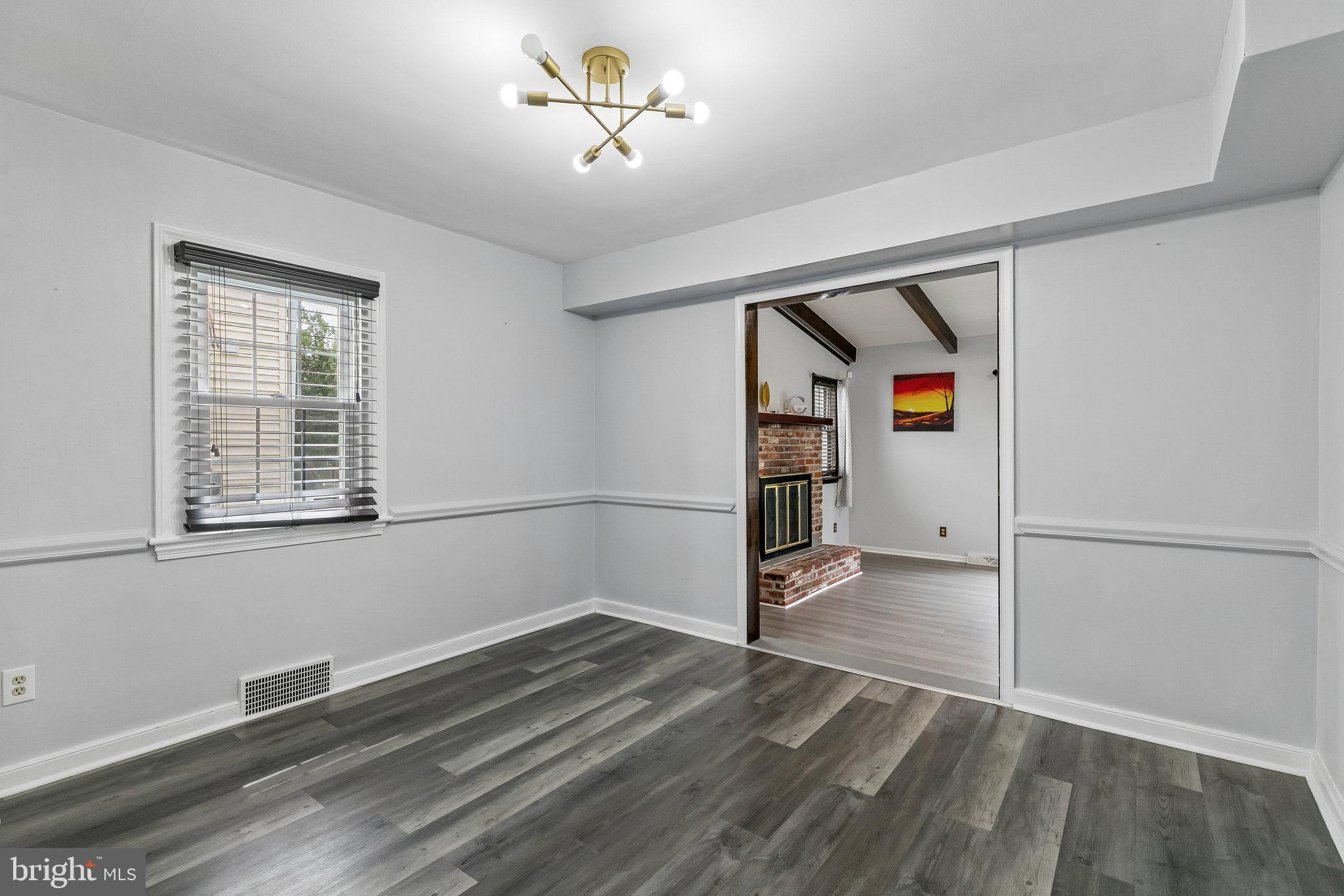 556 Anne Street Huntingdon Valley, PA 19006 - Photo 30 of 50 wooden floor in an empty room with a window