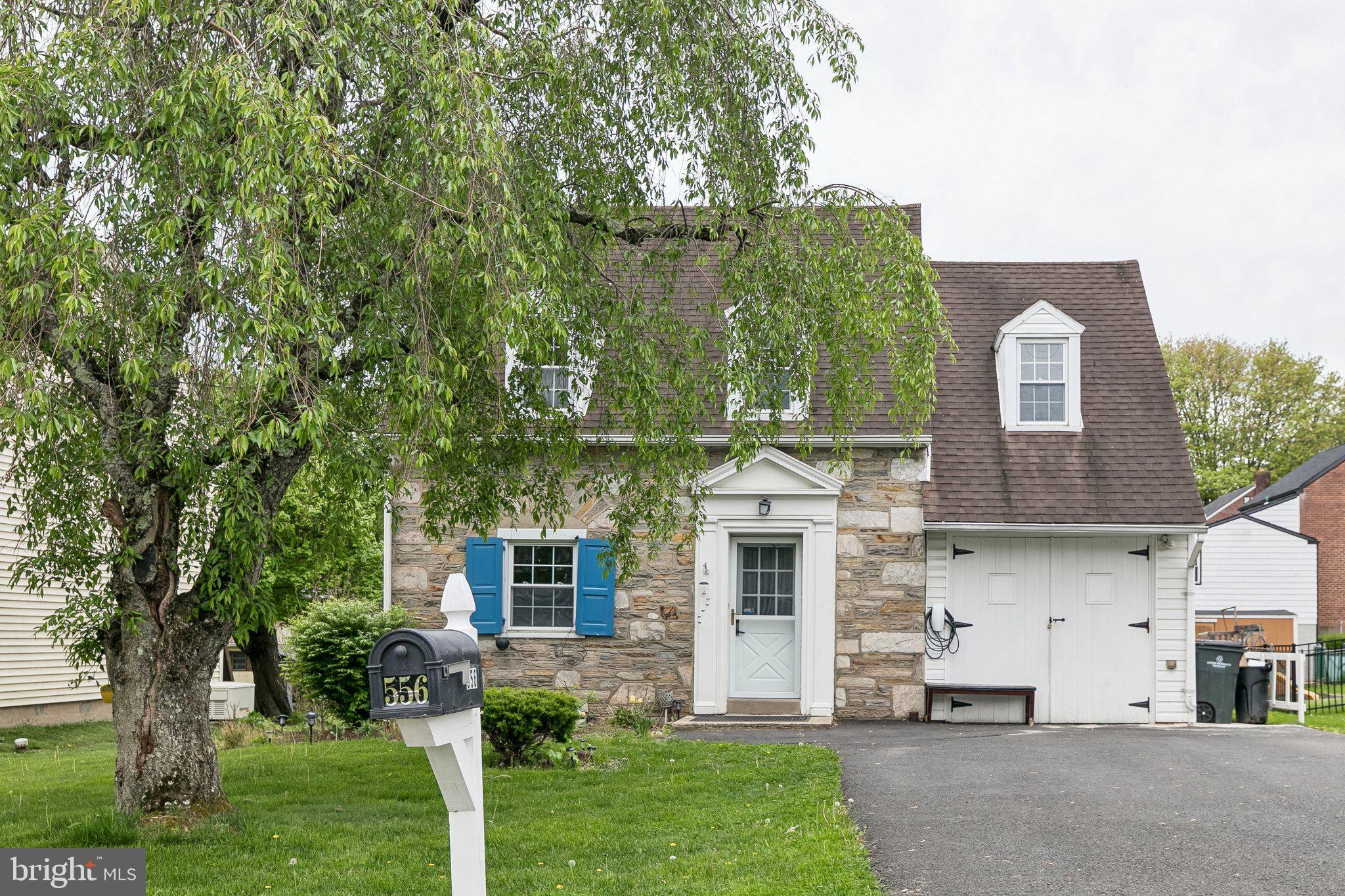 556 Anne Street Huntingdon Valley, PA 19006 - Photo 3 of 50 a view of a house with a yard