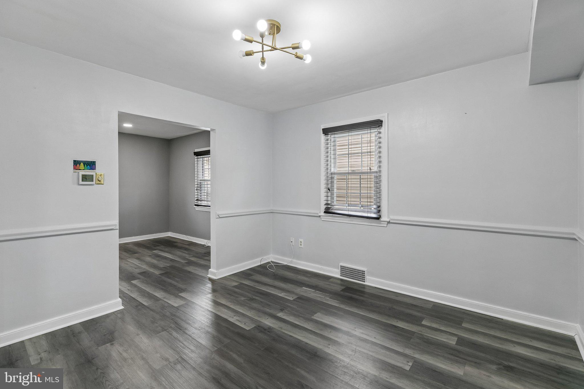 556 Anne Street Huntingdon Valley, PA 19006 - Photo 31 of 50 a view of empty room with wooden floor and fan
