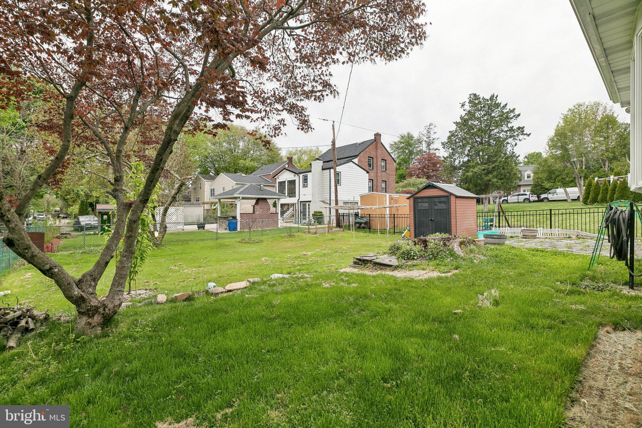 556 Anne Street Huntingdon Valley, PA 19006 - Photo 38 of 50 a front view of a house with garden