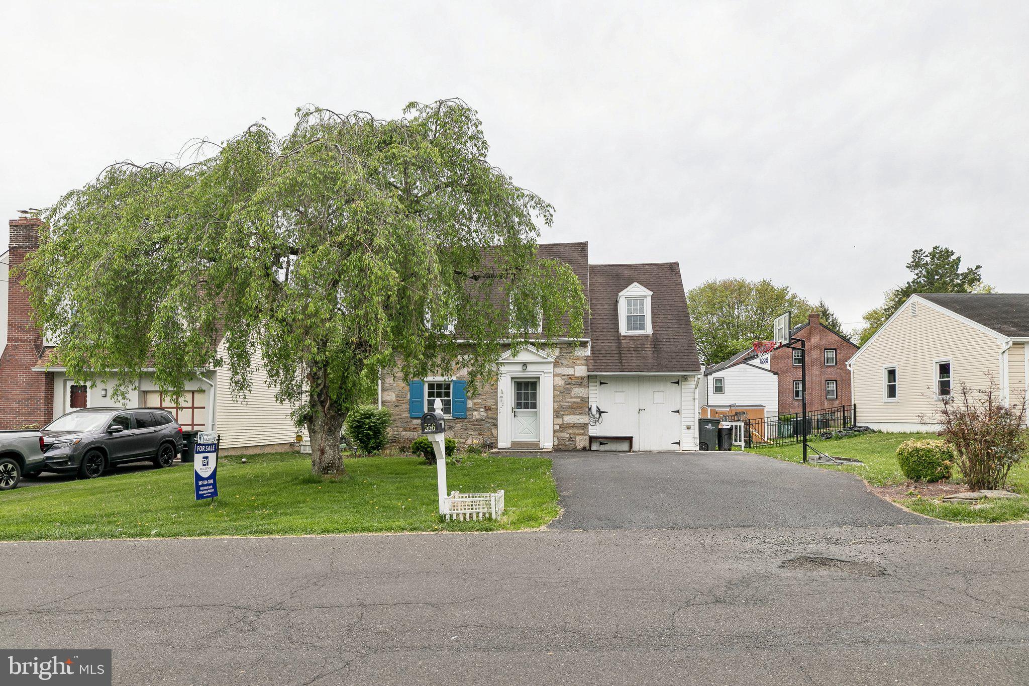 556 Anne Street Huntingdon Valley, PA 19006 - Photo 4 of 50 a view of road with card parked