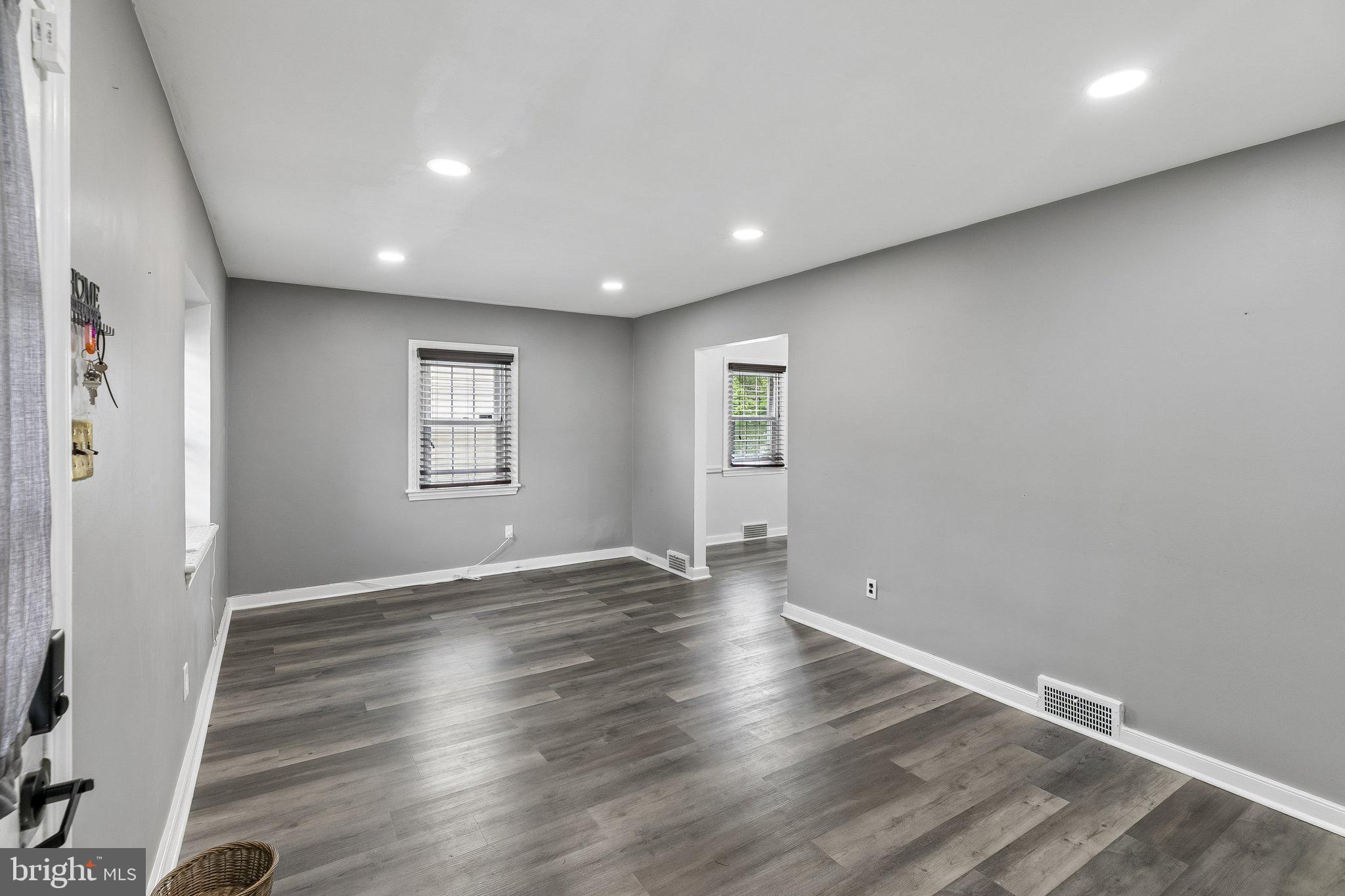 556 Anne Street Huntingdon Valley, PA 19006 - Photo 43 of 50 an empty room with wooden floor and windows