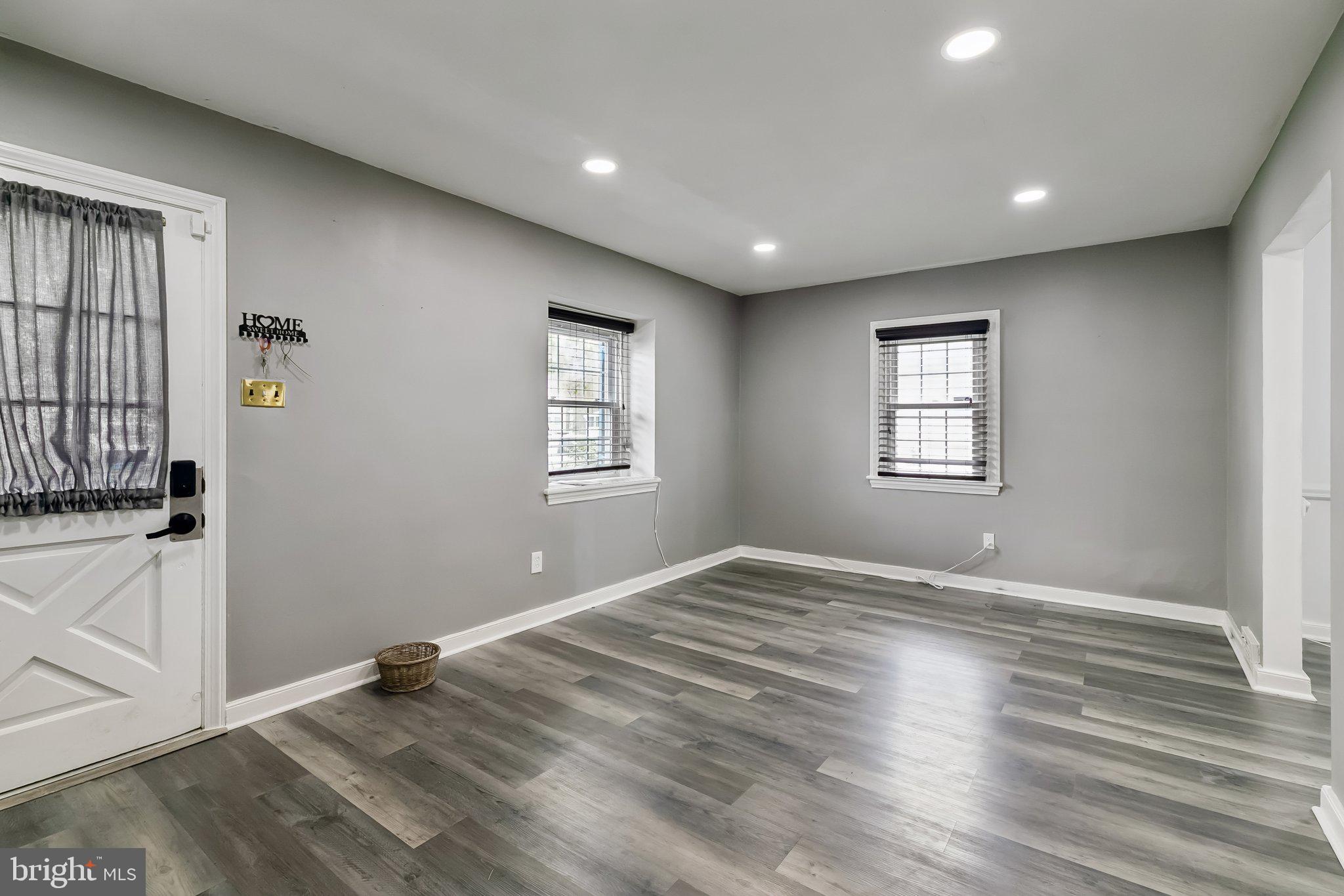 556 Anne Street Huntingdon Valley, PA 19006 - Photo 44 of 50 a view of empty room with wooden floor and fan