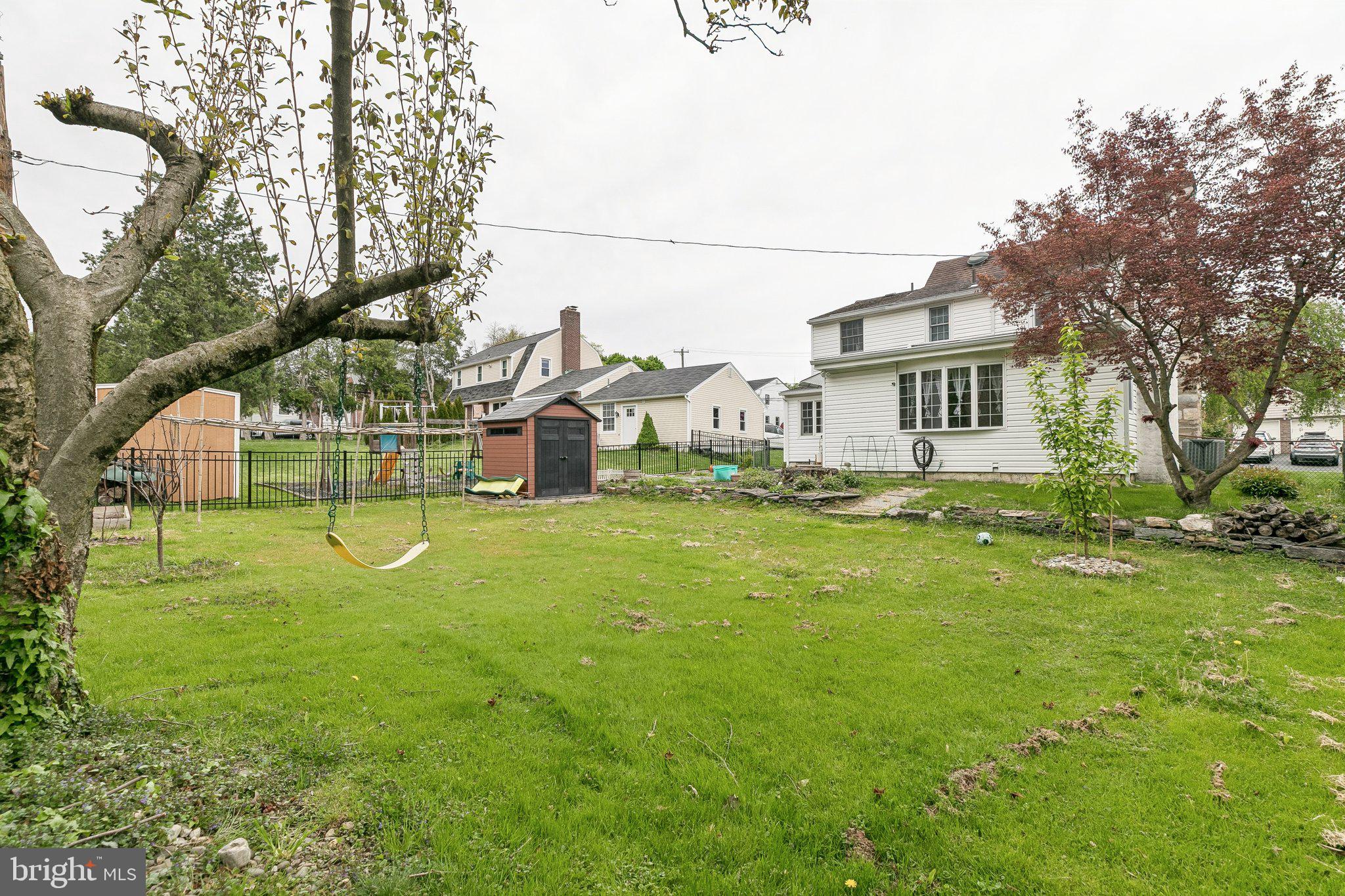 556 Anne Street Huntingdon Valley, PA 19006 - Photo 49 of 50 a view of a house with a back yard