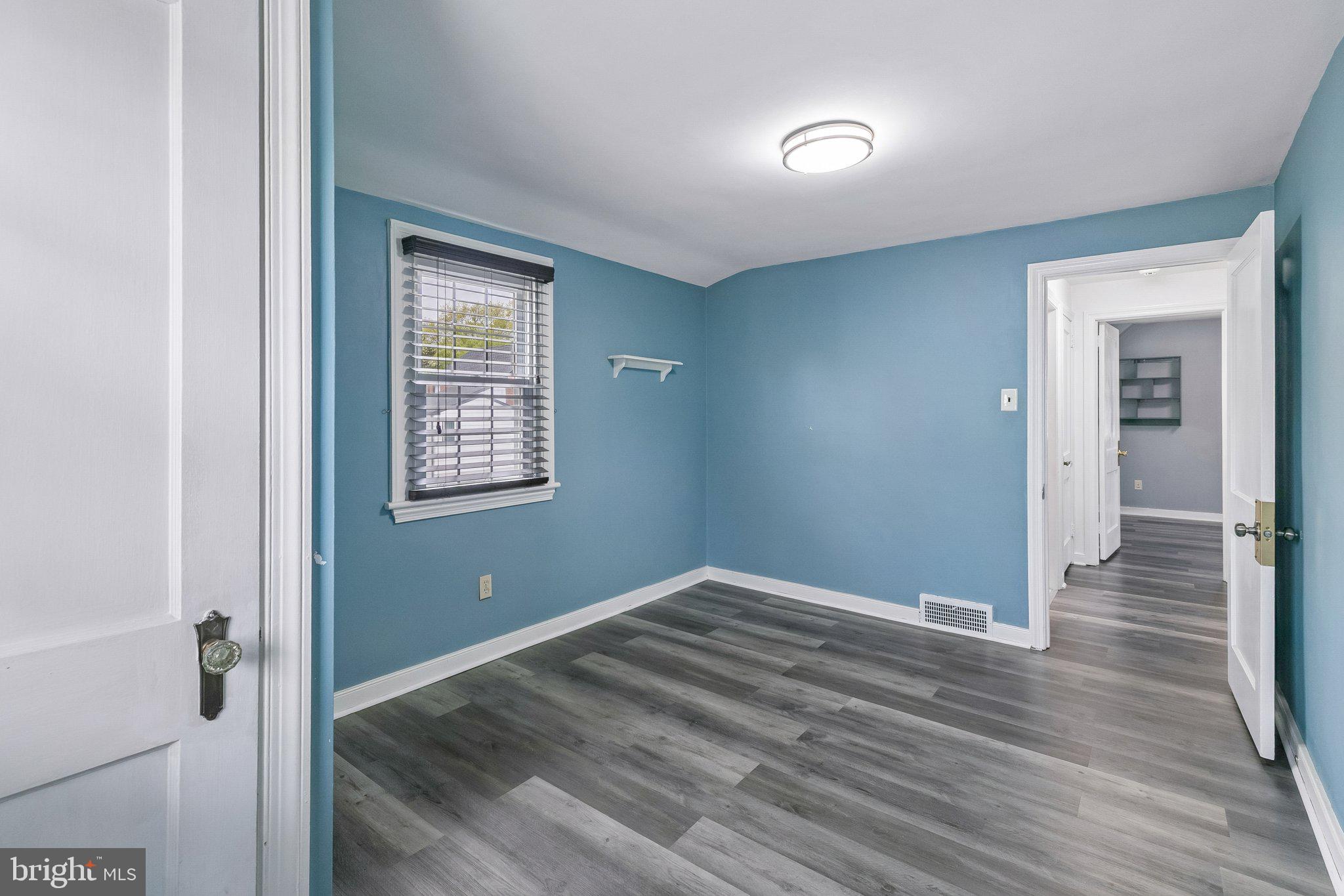 556 Anne Street Huntingdon Valley, PA 19006 - Photo 6 of 50 a view of empty room with wooden floor and fan