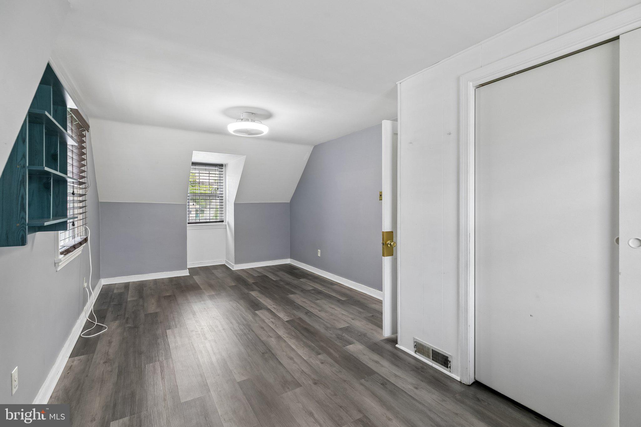556 Anne Street Huntingdon Valley, PA 19006 - Photo 10 of 50 a view of empty room with wooden floor and fan