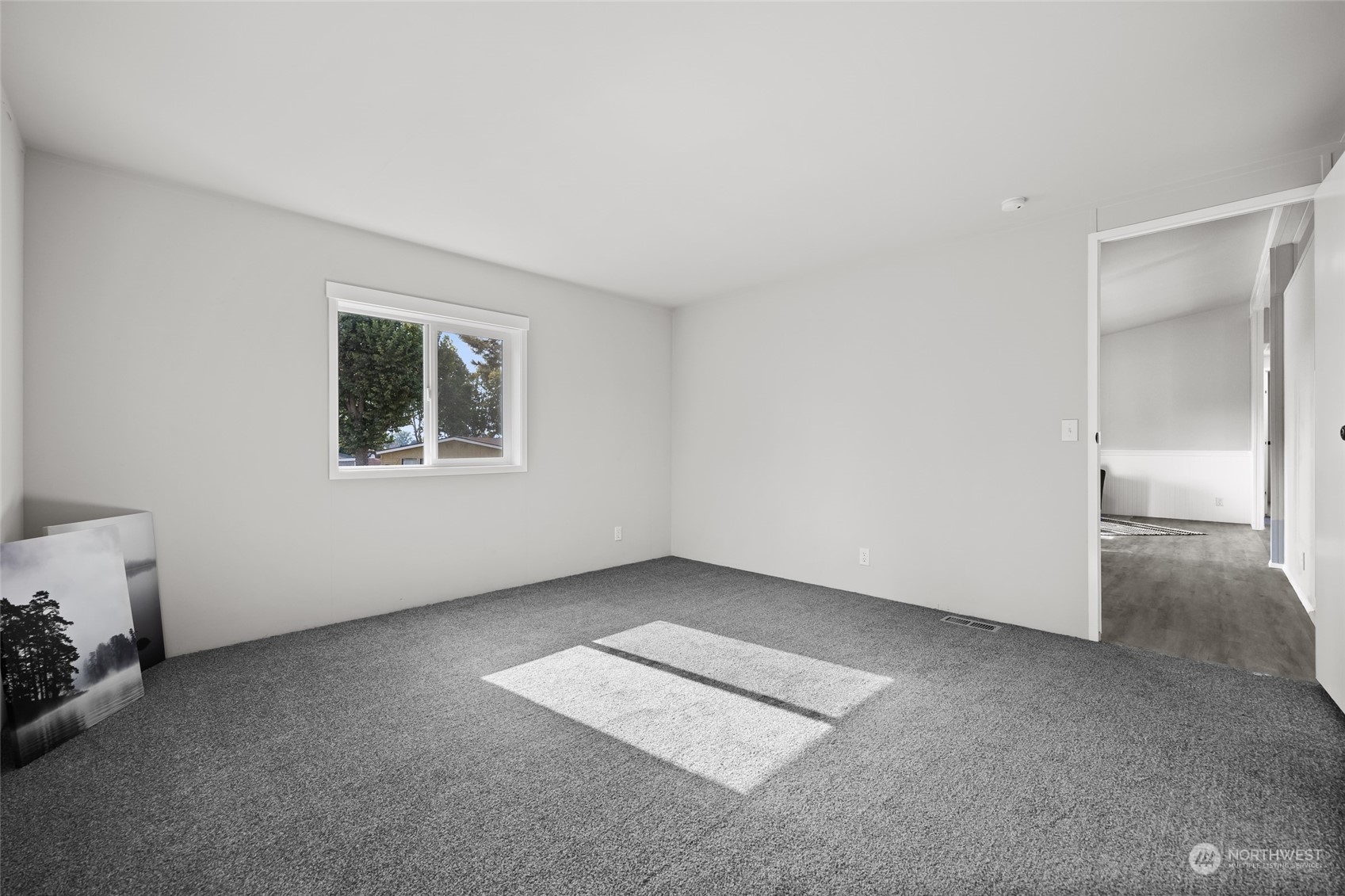 3517 N Road, Unit 115E Pasco, WA 99301 - Photo 14 of 26 a view of an empty room with a window