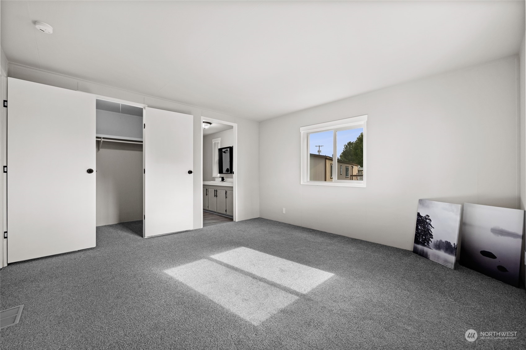 3517 N Road, Unit 115E Pasco, WA 99301 - Photo 15 of 26 a view of an empty room with a window