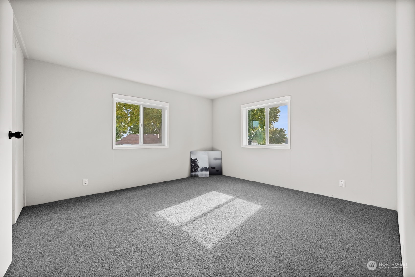 3517 N Road, Unit 115E Pasco, WA 99301 - Photo 16 of 26 an empty room with windows