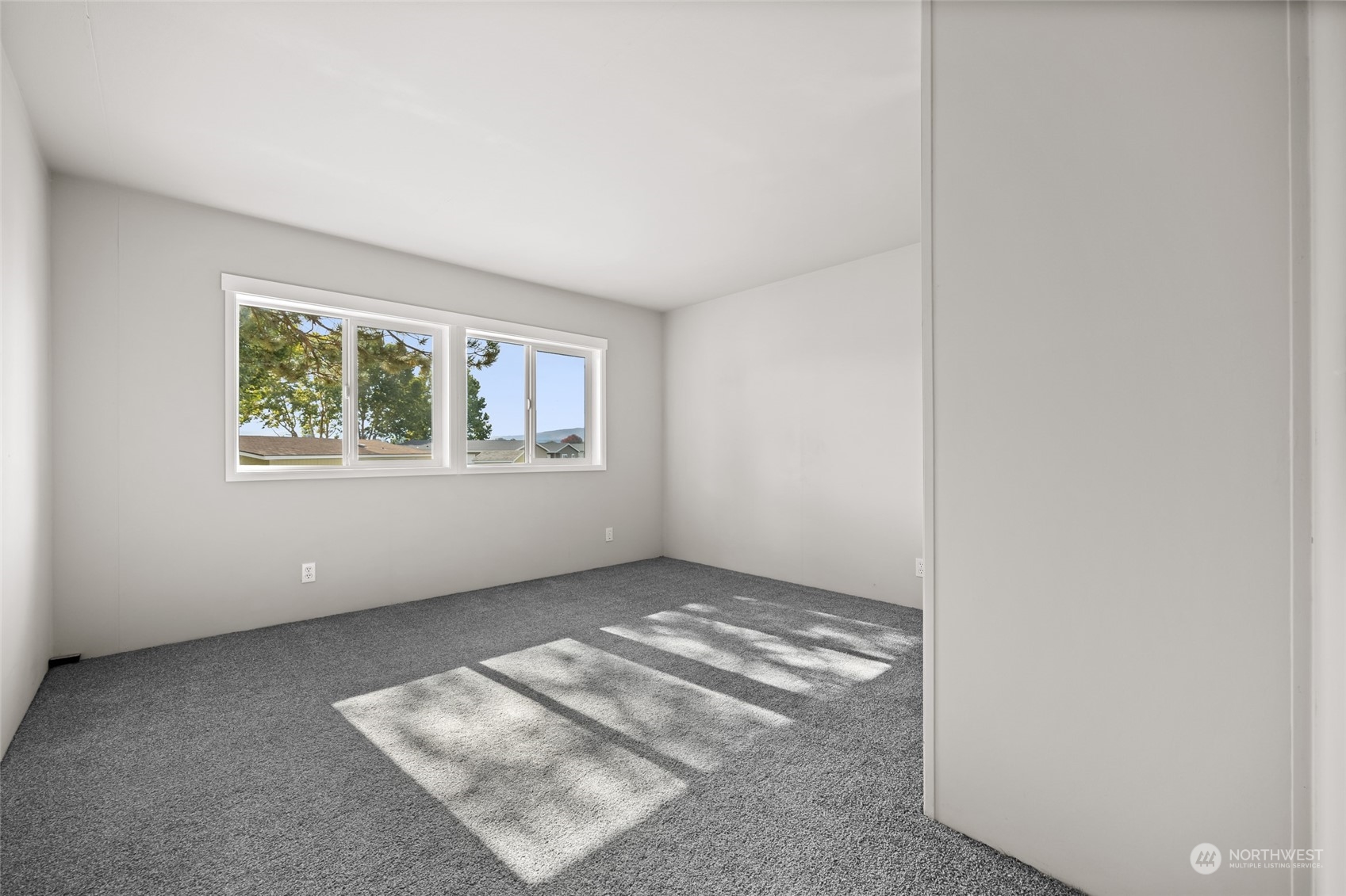 3517 N Road, Unit 115E Pasco, WA 99301 - Photo 20 of 26 an empty room with windows