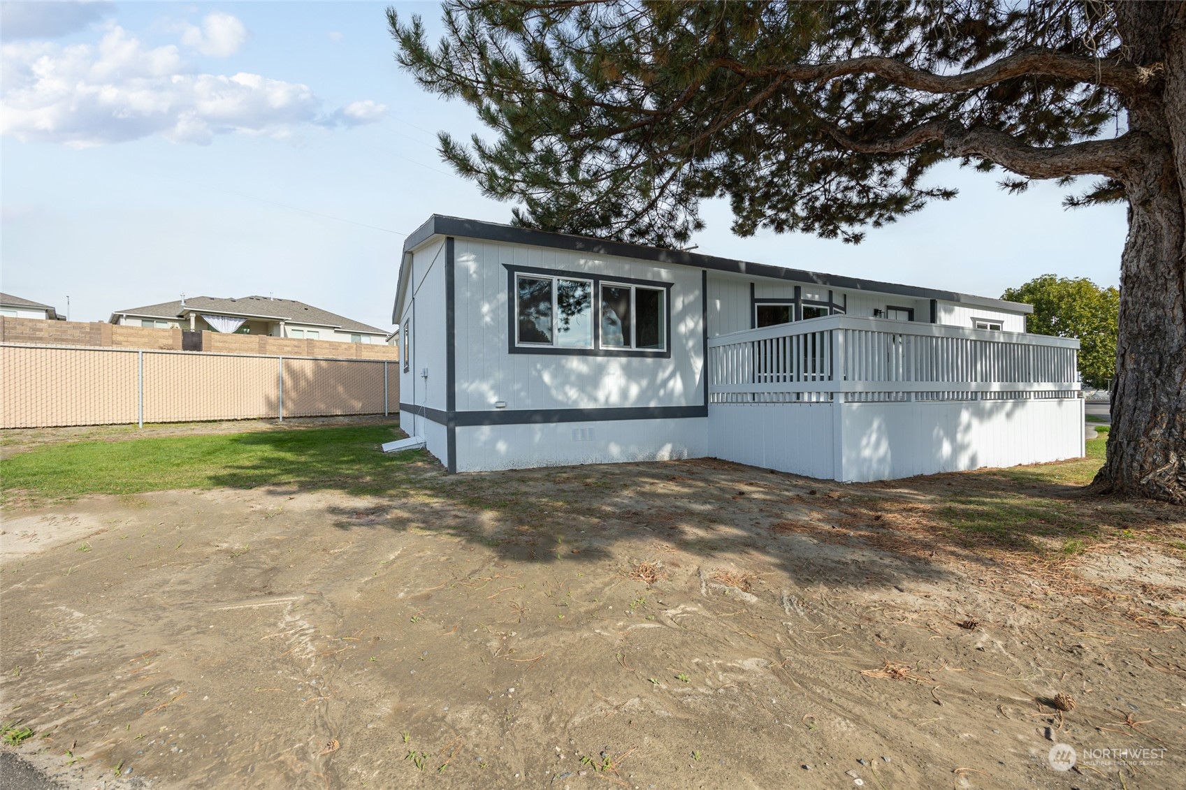 3517 N Road, Unit 115E Pasco, WA 99301 - Photo 25 of 26 a view of a house with a yard