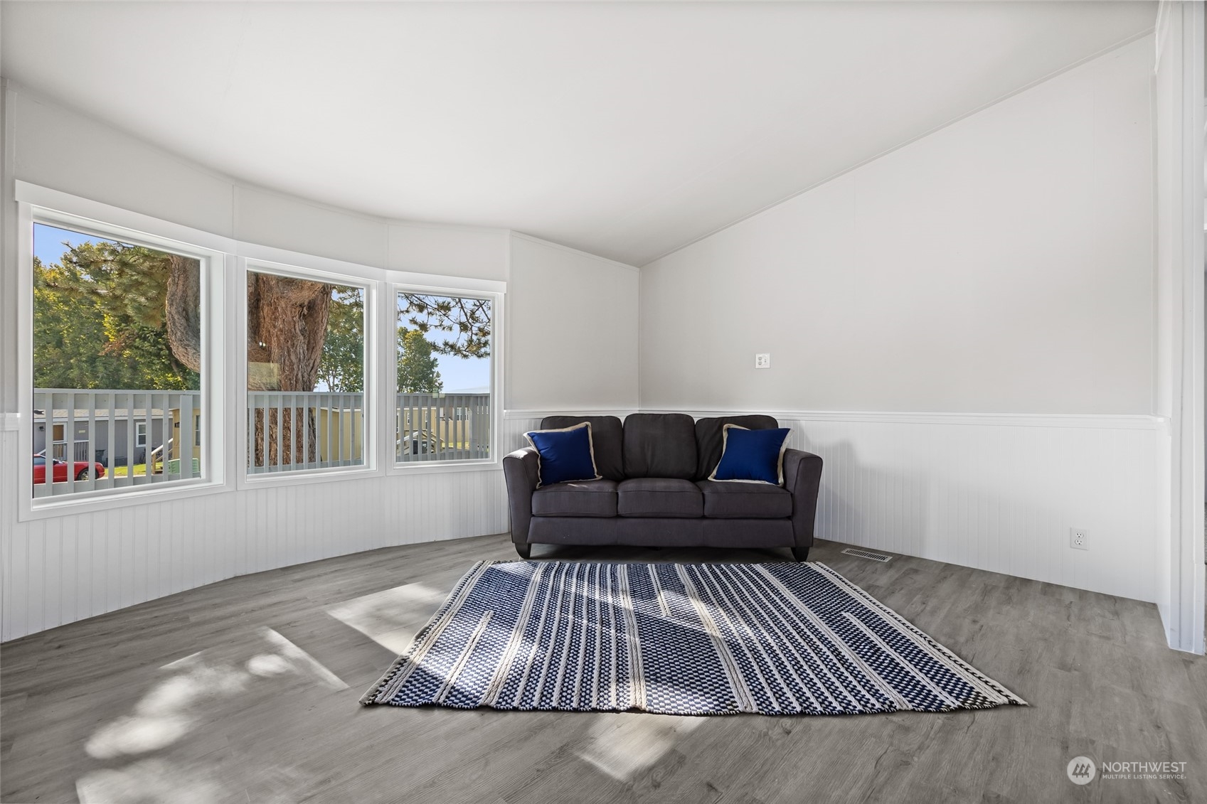 3517 N Road, Unit 115E Pasco, WA 99301 - Photo 4 of 26 a living room with furniture and a window
