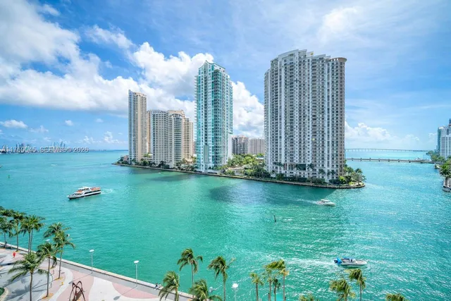 a view of a city with tall buildings in the background