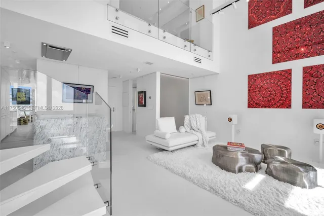 a bedroom with furniture and a couch